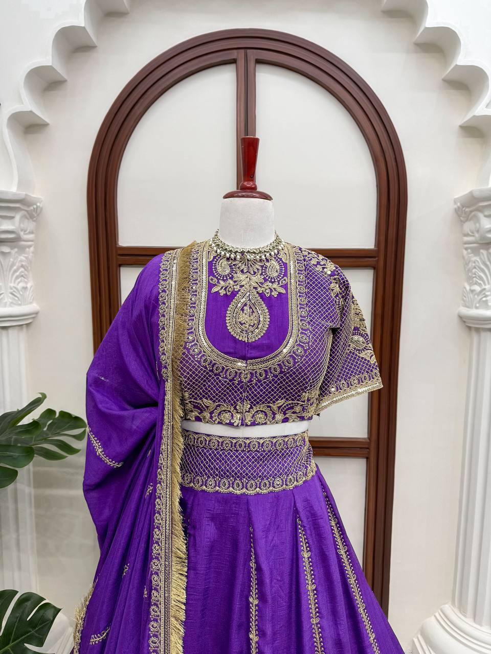 Royal Amethyst Purple Silk Lehenga Choli with Majestic Gold Zari Heritage Motifs and Elaborate Borders